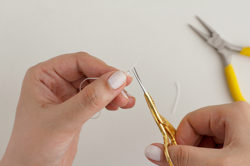 DIY: Perlenarmband mit zwei Knoten als Verschluss | we love handmade